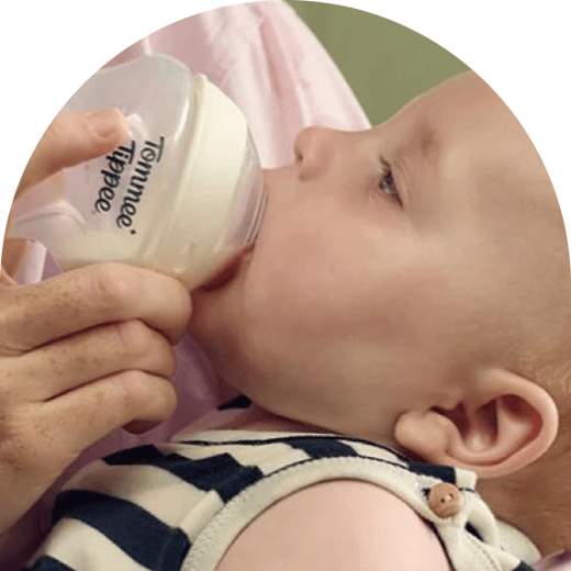 Baby feeding from a bottle